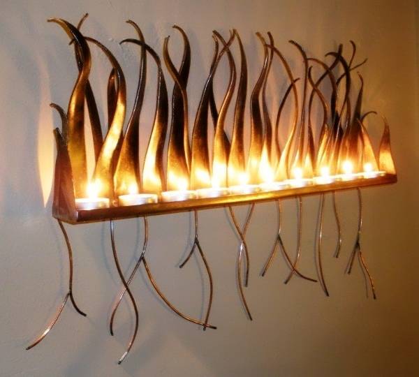 Кованые подсвечники на стену — 25 фото с идеями дизайна