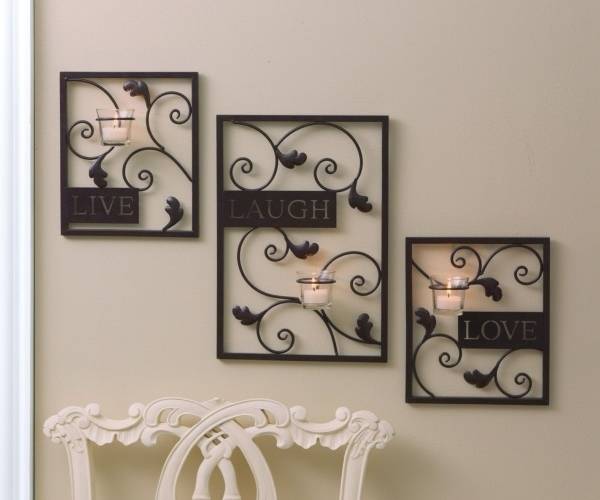 Кованые подсвечники на стену — 25 фото с идеями дизайна