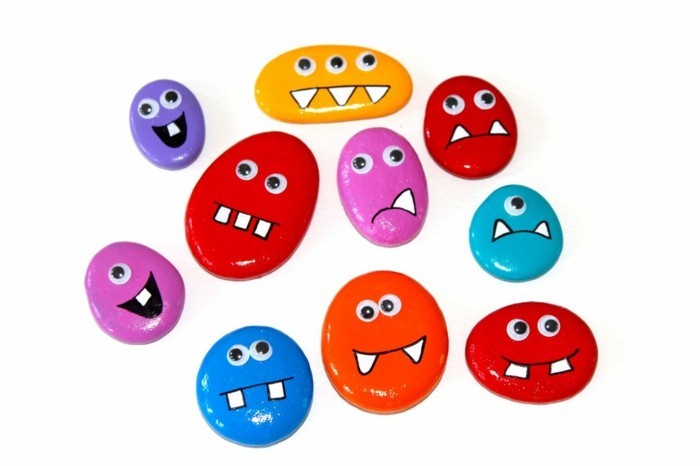 Рисование на камнях или роспись садовых камней