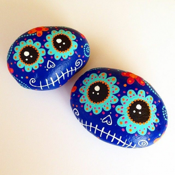 Рисование на камнях или роспись садовых камней