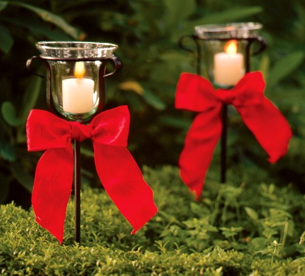 Украшение клумбы и цветника: фигурки на колышке