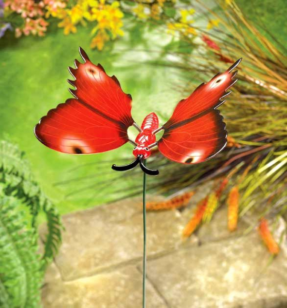 Украшение клумбы и цветника: фигурки на колышке