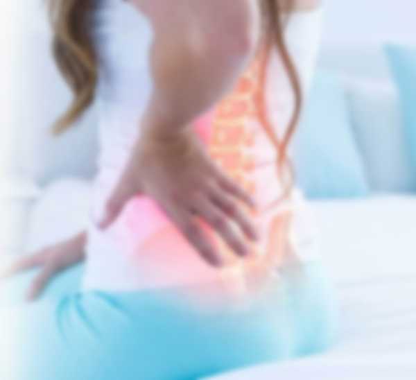 Причины ноющей боли в пояснице у женщин Причины ноющей боли в пояснице у женщин