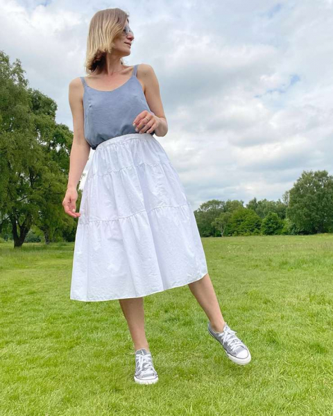 Воздушность и романтика: с чем носить трендовую ярусную юбку в этом сезоне